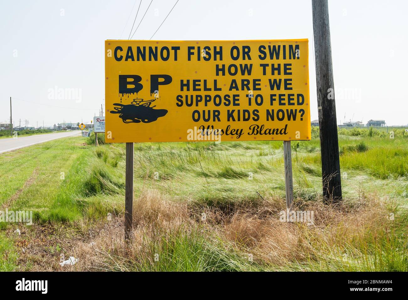 Protest sign by road during Deepwater Horizon oil spill, Louisiana, Gulf of Mexico, USA, August 2010 Stock Photo