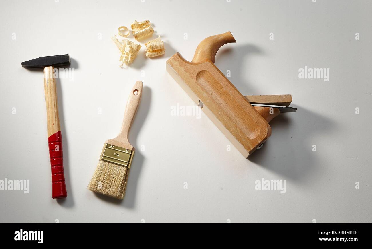 Tool for home improvement on white background, light gray, angle and saw Stock Photo