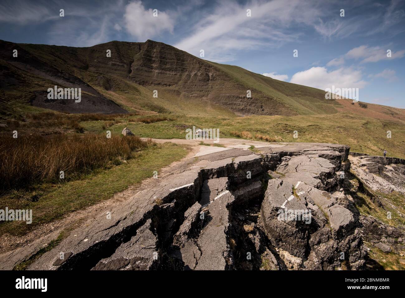 The Mam Tor Landslide, an active landslide with a 70m back scarp slope, which truncates the old Sheffield to Manchester Road the A625, at Castleton, D Stock Photo