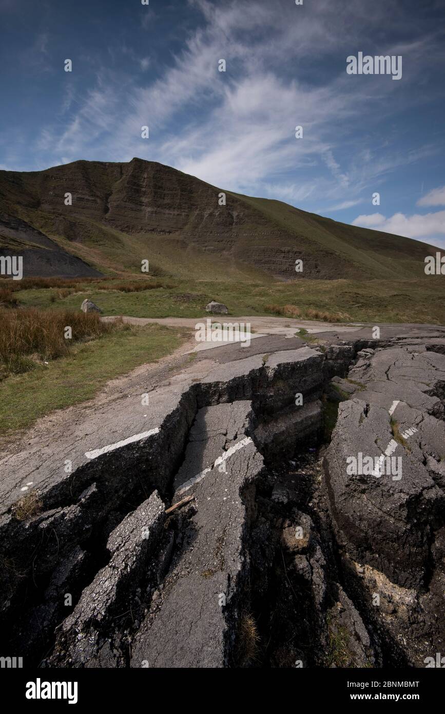 The Mam Tor Landslide, an active landslide with a 70m back scarp slope, which truncates the old Sheffield to Manchester Road the A625, at Castleton, D Stock Photo