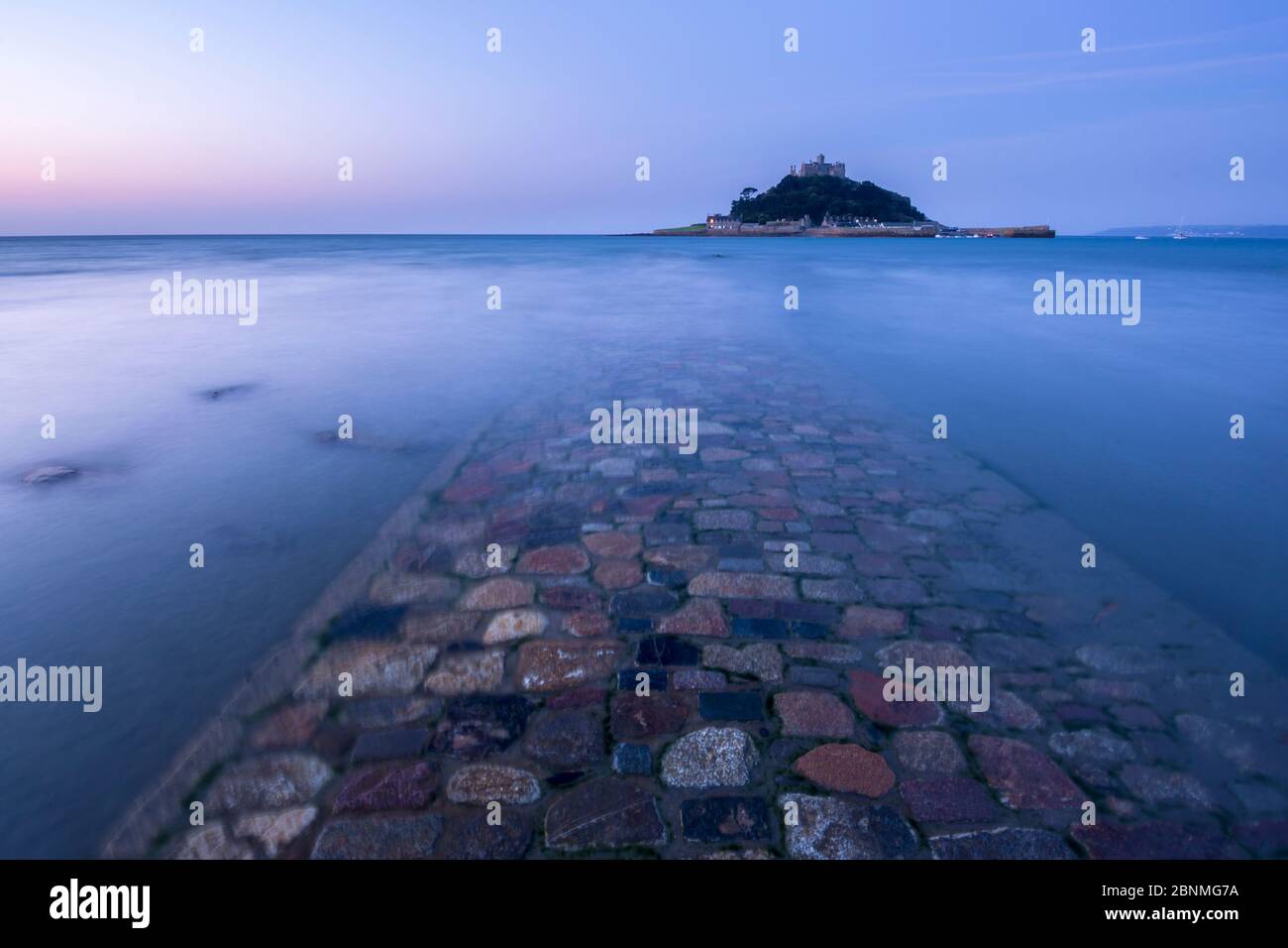 St Michael's Mount and old causeway at twilight, Marazion, Cornwall, England, UK. September 2015. Stock Photo