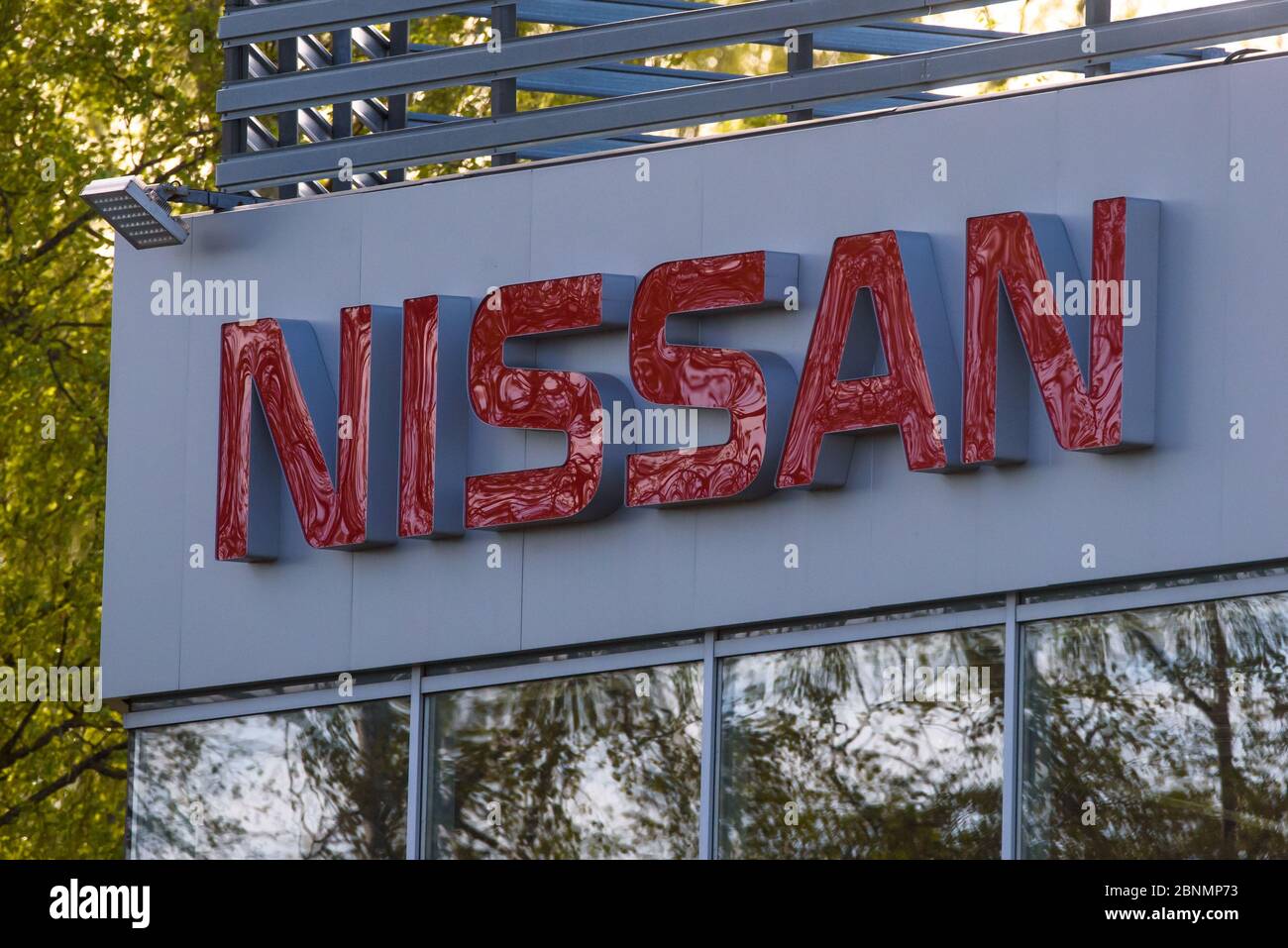 RIGA, LATVIA. 7th May 2020. NISSAN company logo on automobile centre building. Nissan Motor Corporation is a Japanese multinational automobile manufac Stock Photo