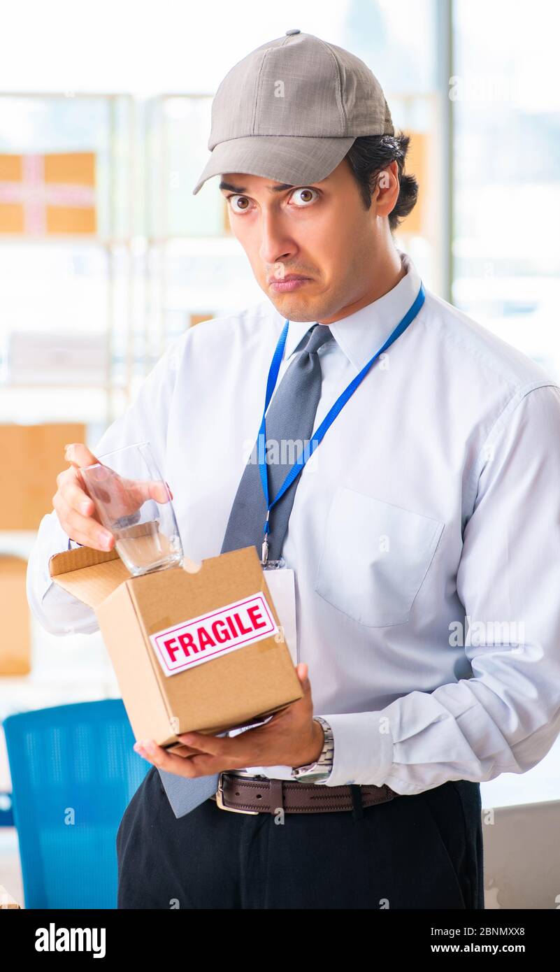 The male employee working in box delivery relocation service Stock Photo Alamy