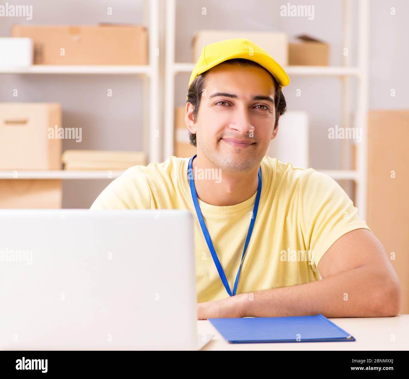 The handsome contractor working in box delivery relocation service Stock Photo Alamy