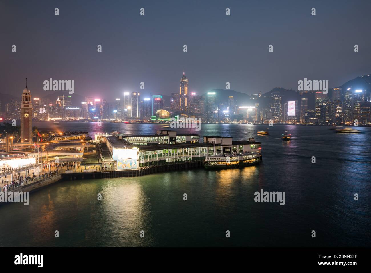 China, Hong Kong, Victoria Harbor at night Stock Photo
