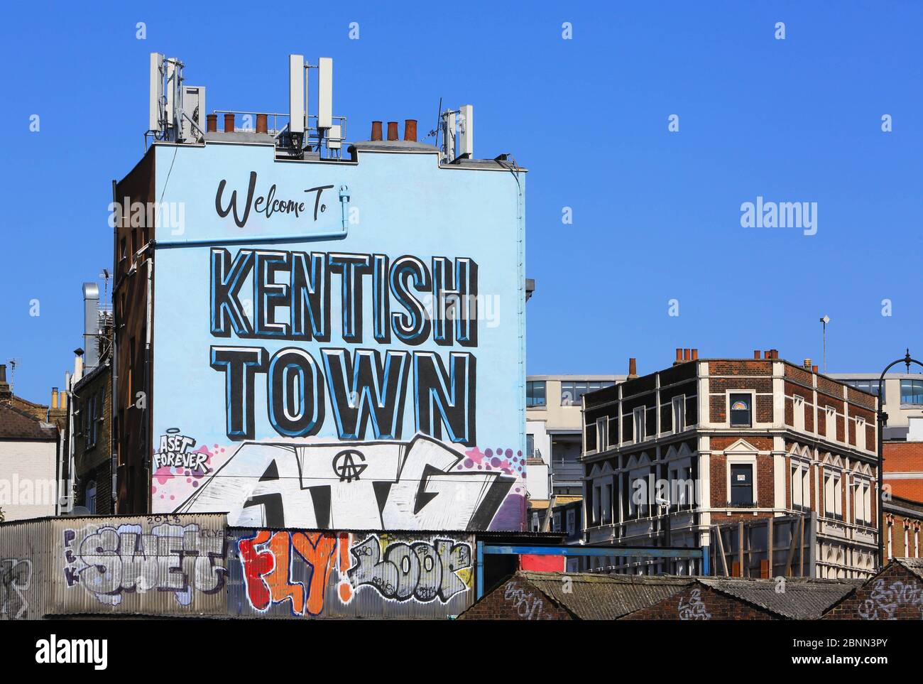 to Kentish Town' mural on the side of a house on Highgate Road, in north London, UK