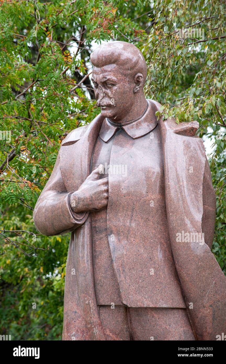Vandalized Stalin statue in the Graveyard of Fallen Monuments in Moscow Russia Stock Photo