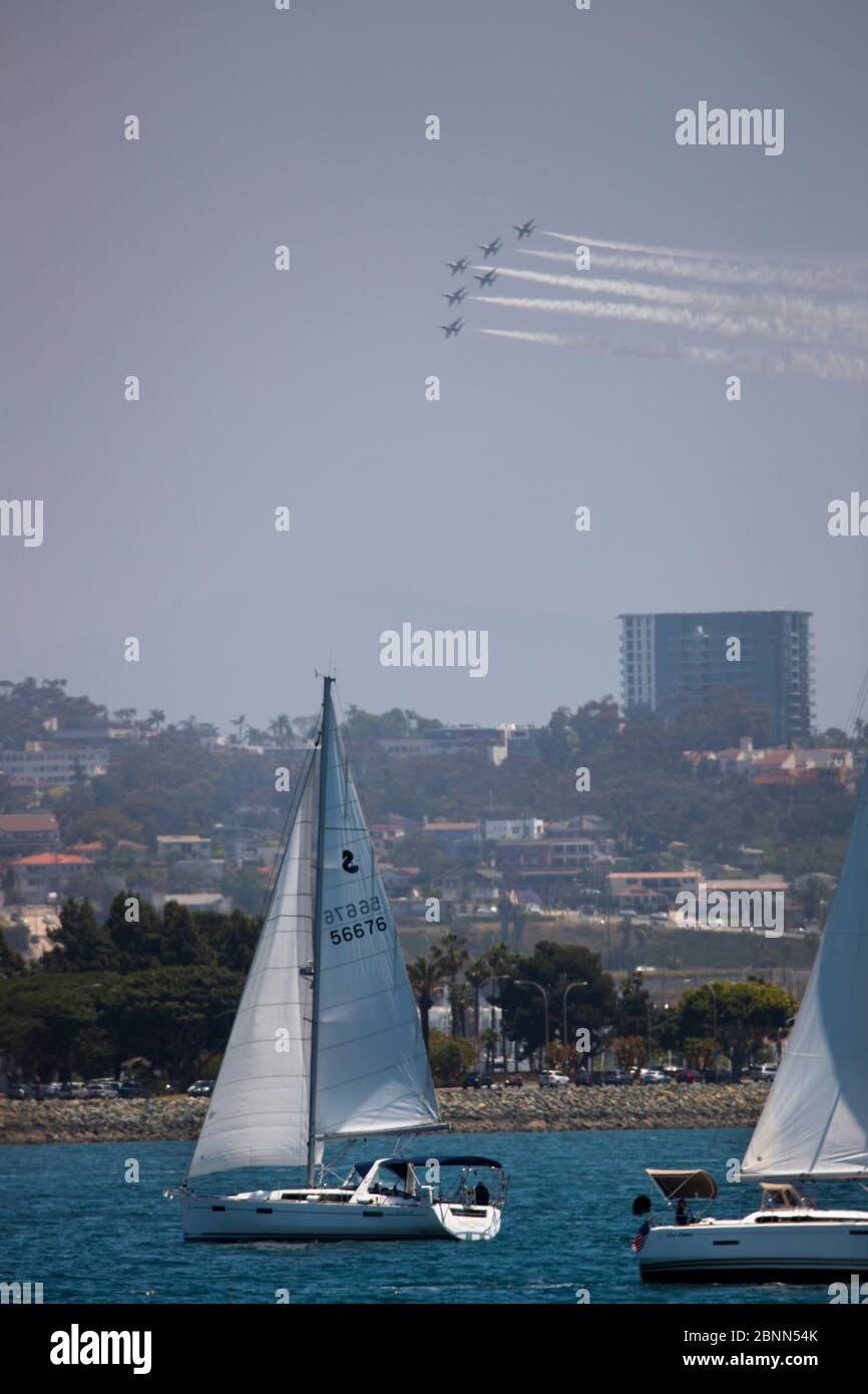 San Diego, California, USA. 15th May, 2020. The United States Air Force Thunderbirds F-16C Fighting Falcons flyover San Diego during an America Strong flyover as a salute to frontline COVID-19 responders. Credit: KC Alfred/ZUMA Wire/Alamy Live News Stock Photo