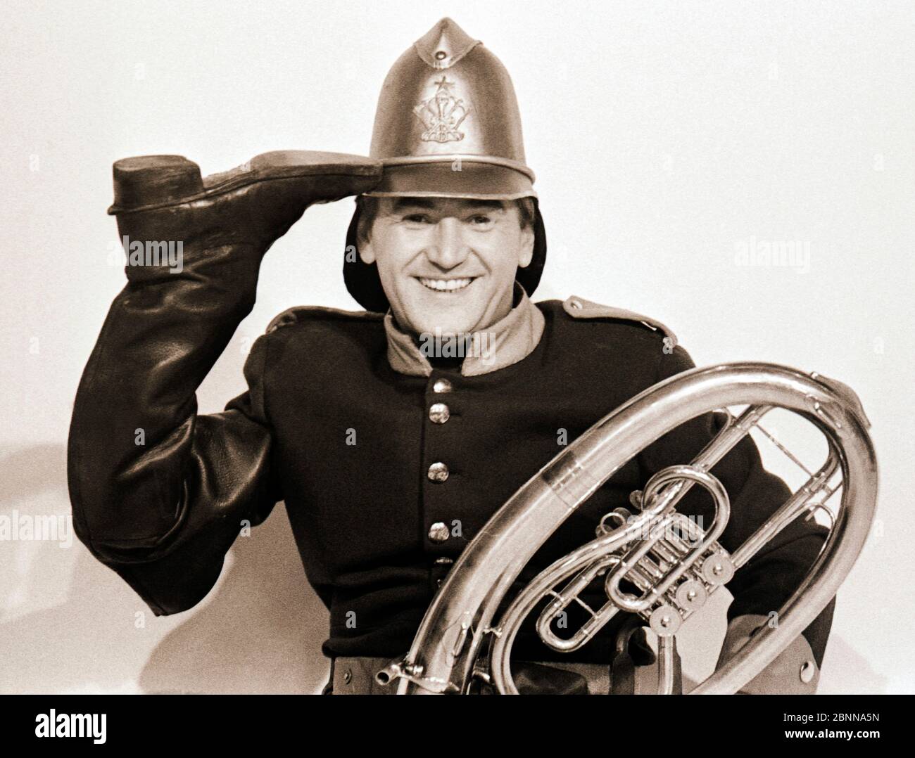 The young pop singer Roland Neudert 1969 as fire chief in the well-known DFF entertainment program 'There is music in it' from the house of the cheerful muse in Leipzig Stock Photo