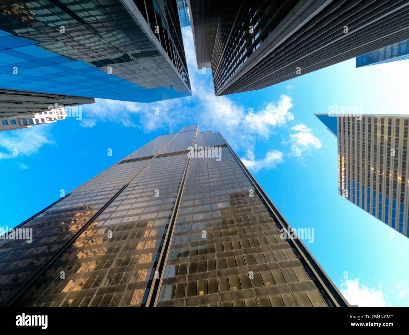 Upward view of chicago skyscraper busnesses and tall office buildings ...