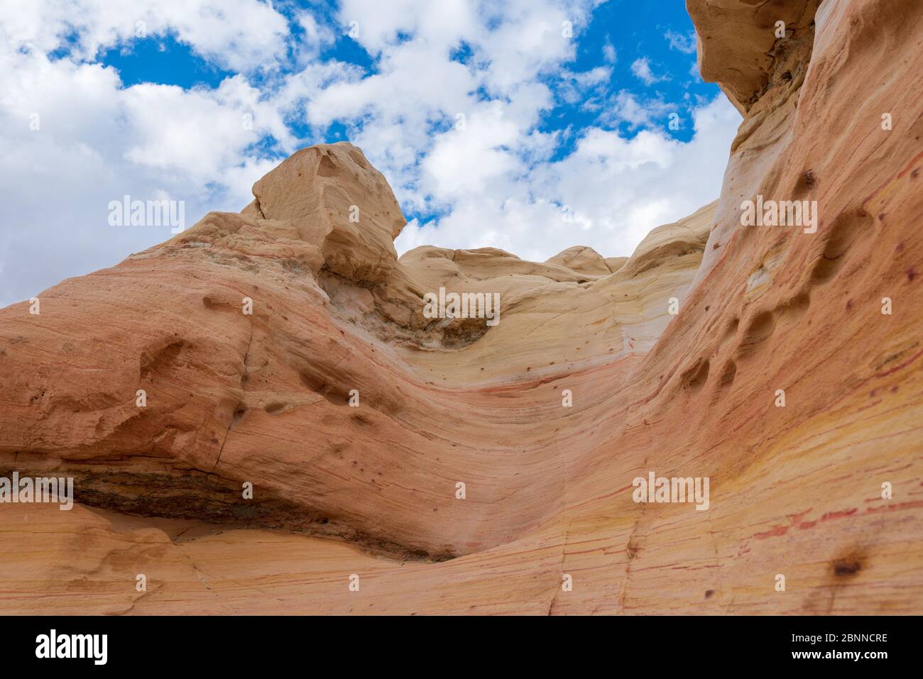Landscape of striped conical rock formations in New Mexico Stock Photo