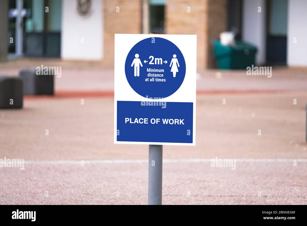 Social distancing sign at work keep 2m apart Stock Photo