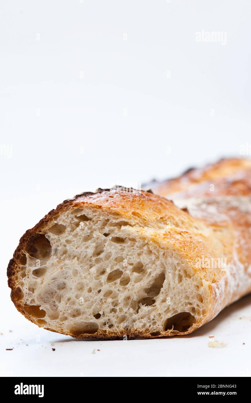 close up of artisanal baguette on white background Stock Photo