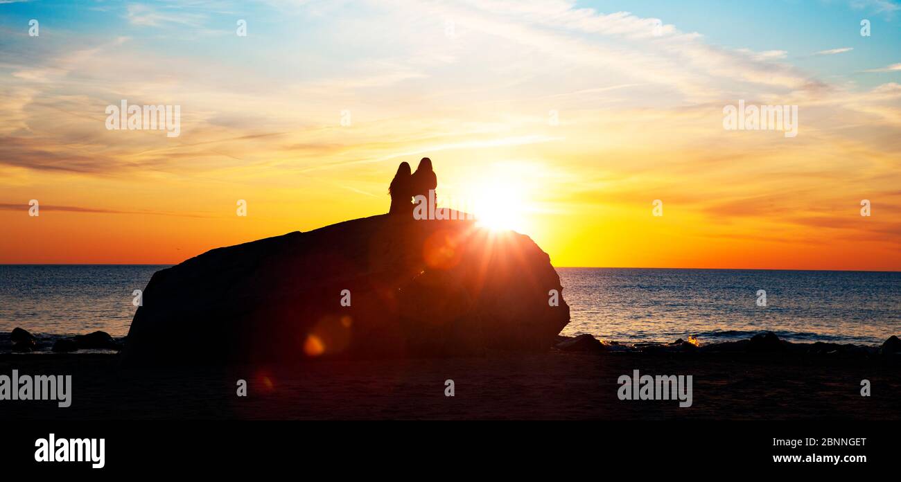 Couple in romantic mood in the sunset Stock Photo