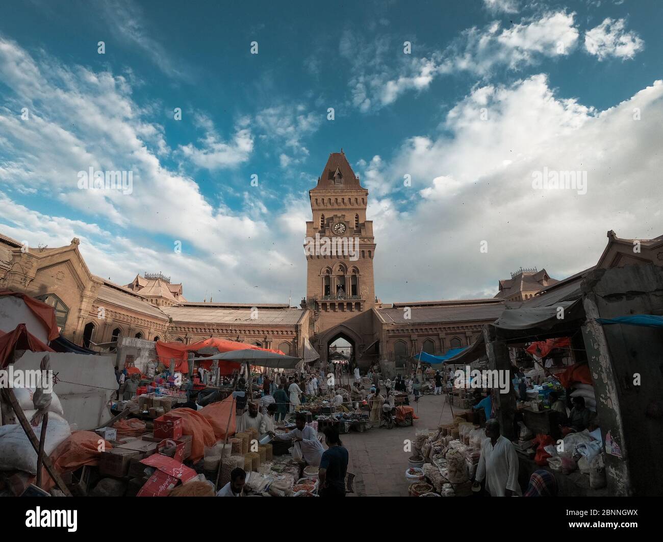 People Selling Different Things In The Beautiful Architecture Of