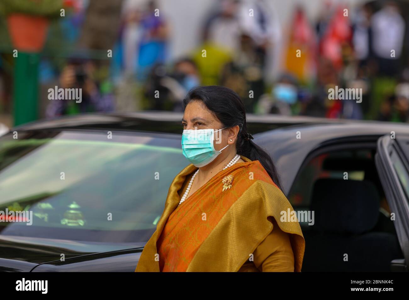 Nepal's President, Bidhya Devi Bhandari wearing a face mask on her arrival at the parliament to present government's policies and programs for the upcoming fiscal year during the Coronavirus (COVID-19) lockdown crisis. Stock Photo