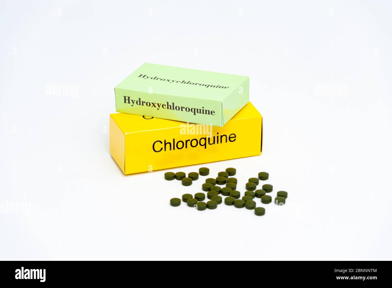 Chloroquine and hydroxychloroquine medicine packs with scattered pills ...