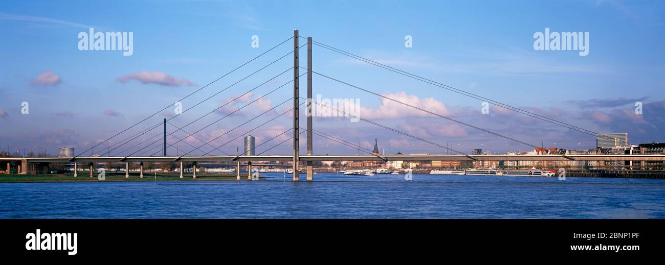 Panoramic view of Rheinkniebrücke (Rhine Knee Bridge) over the Rhine River.  Düsseldorf, Germany Stock Photo