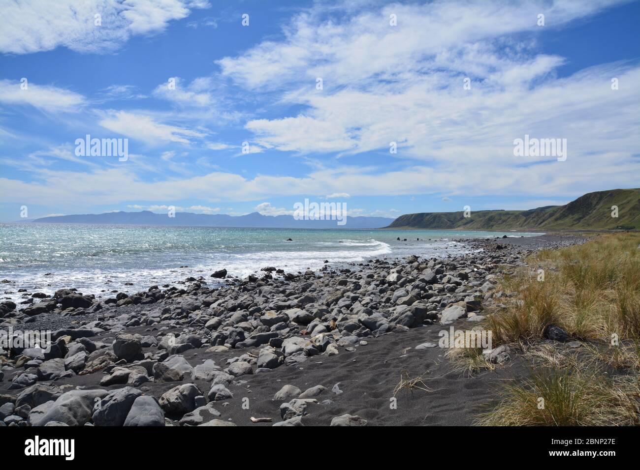Black beach on the way to Cape Palliser, New Zealand Stock Photo