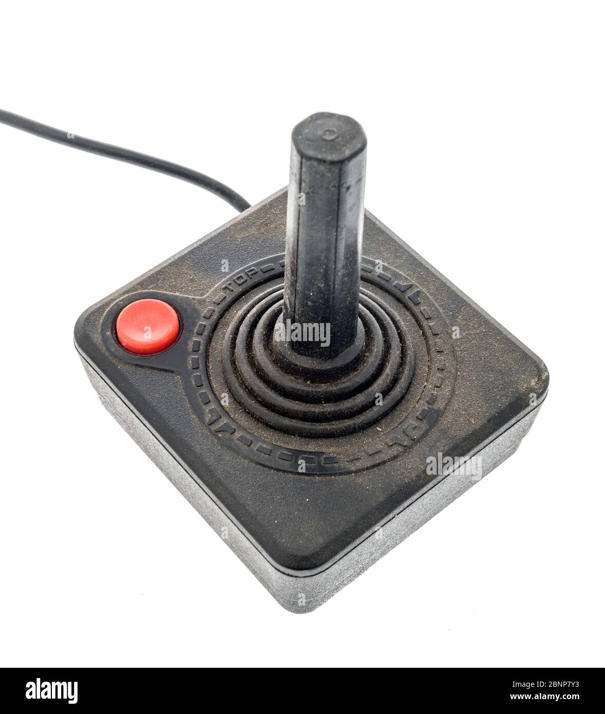 Winneconne,  WI - 5 May 2020:  A package of Atari 2600 joystick controller covered with dust on an isolated background Stock Photo