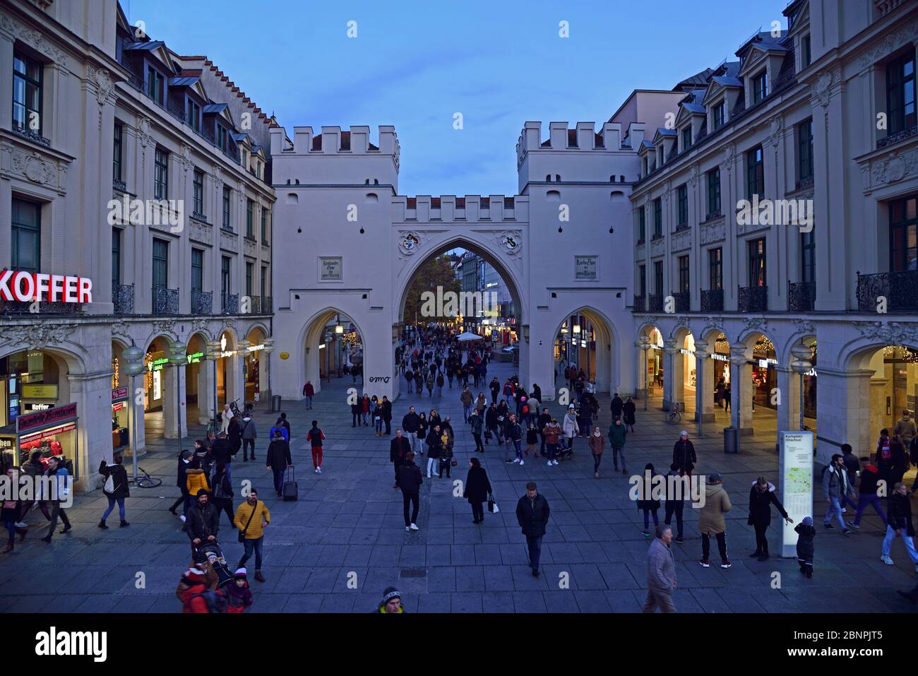 Europe, Germany, Bavaria, Munich, City, Stachus, Karlstor, view into Neuhauser Strasse, shopping mile, evening, many passers-by Stock Photo
