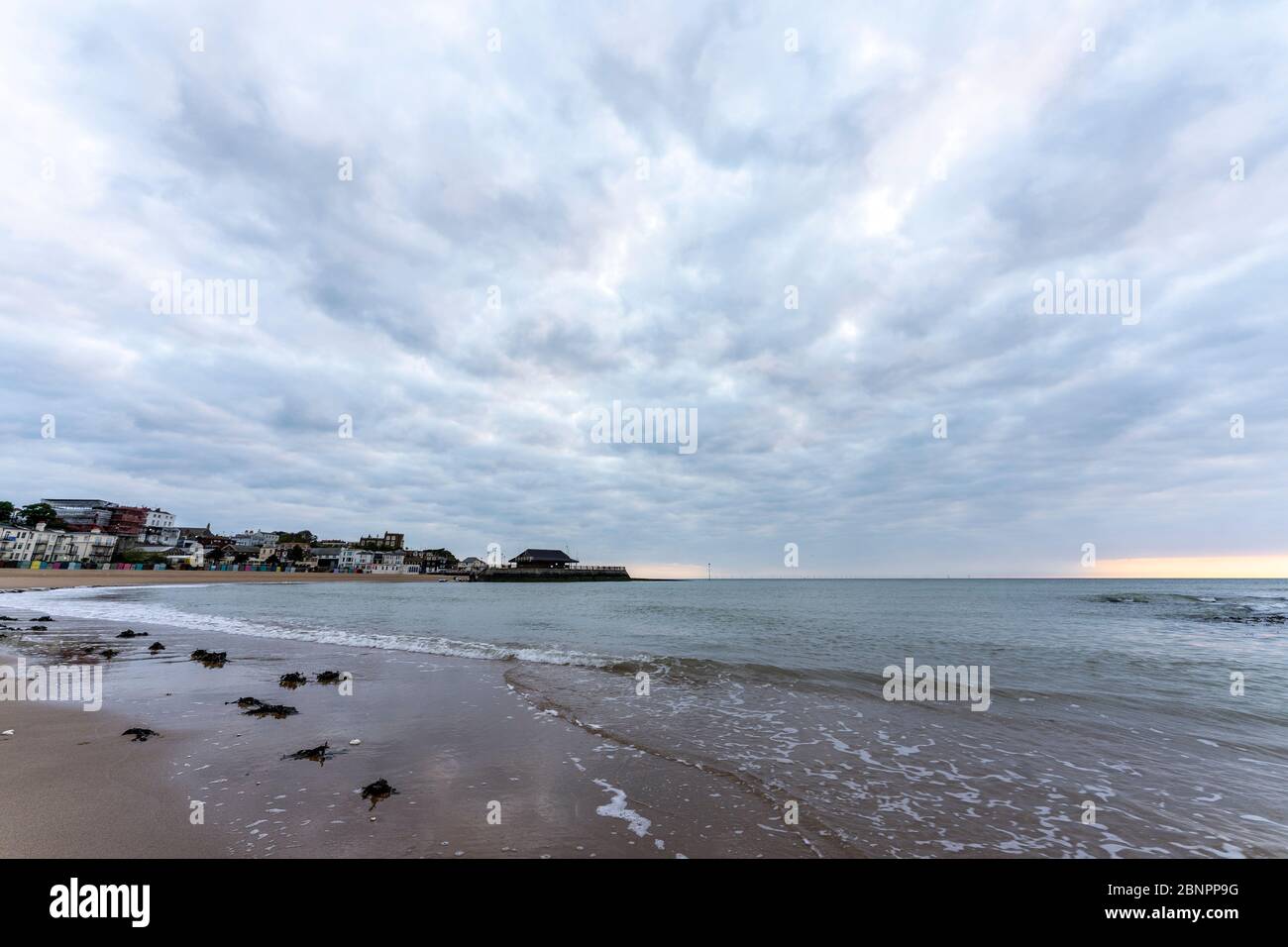 Shoreline along the beach at Viking Bay, Broadstairs, with the tide