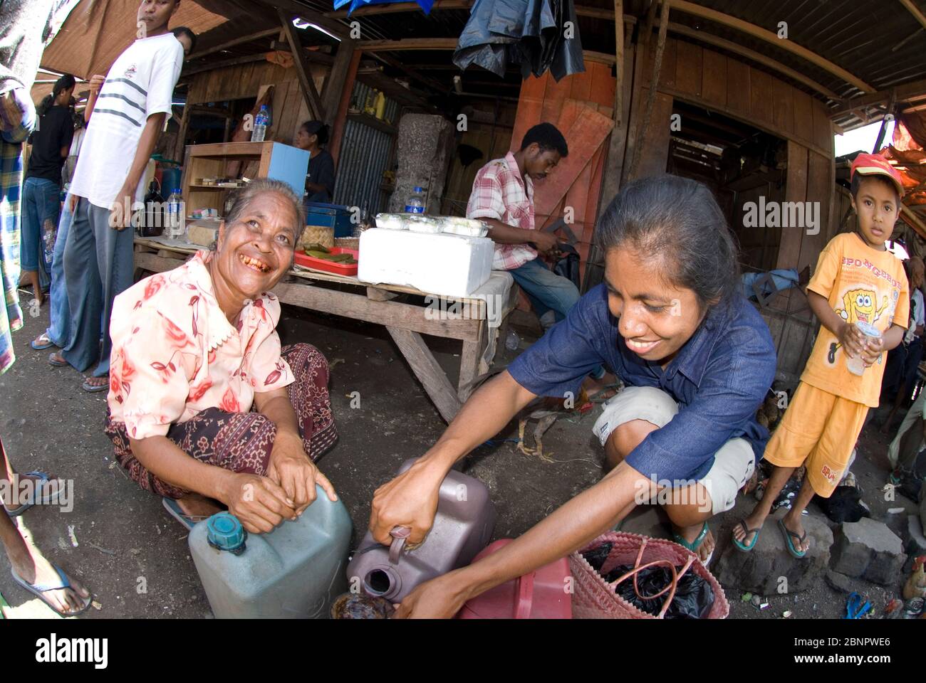 Women selling alcohol, Market, Maumere, Flores, Banda Sea, Indonesia