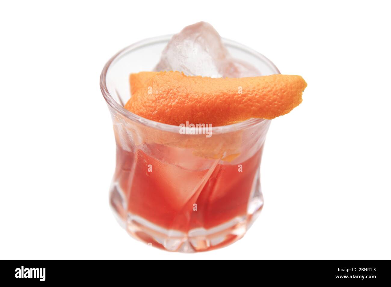 https://c8.alamy.com/comp/2BNR1J3/reddish-brown-cocktail-in-a-rocks-glass-on-an-isolated-white-background-the-cocktail-is-garnished-with-an-orange-twist-and-hand-cut-ice-2BNR1J3.jpg