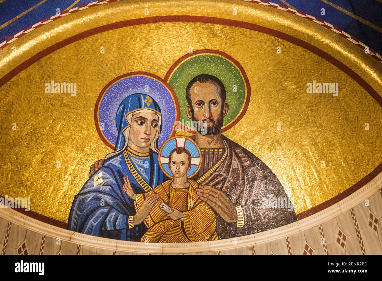 England, London, Westminster, Westminster Cathedral, Chapel of St Joseph, Mosaic Frescoe Showing Joseph and Mary and the Baby Jesus Stock Photo