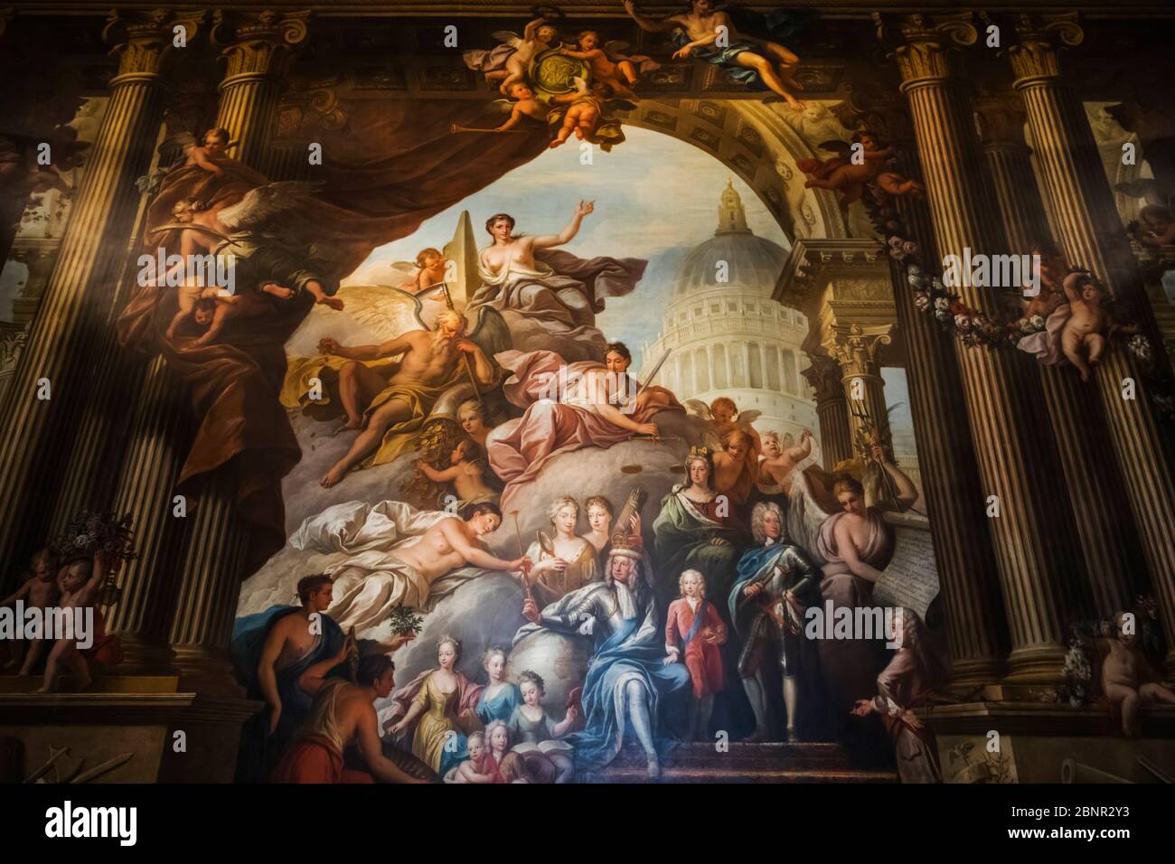 England, London, Greenwich, The Old Royal Naval College, The Painted Hall, The West Wall, Artwork Showing George I, Prince Frederick, and George II Surrounded by Various Gods and Members of The Royal Family Stock Photo
