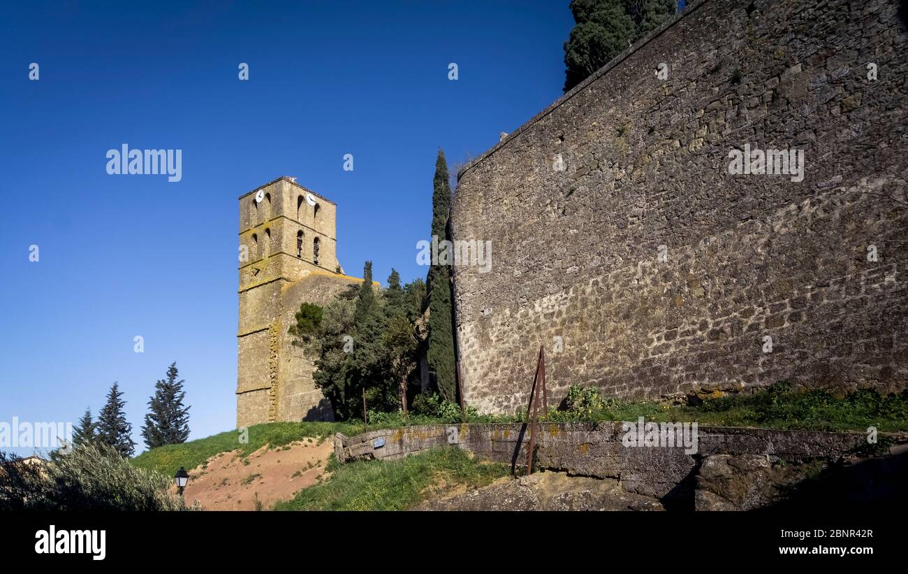 Notre Dame Church in Puichéric. Construction started in the XII century and ended in the XVIIII century. Monument historique Stock Photo