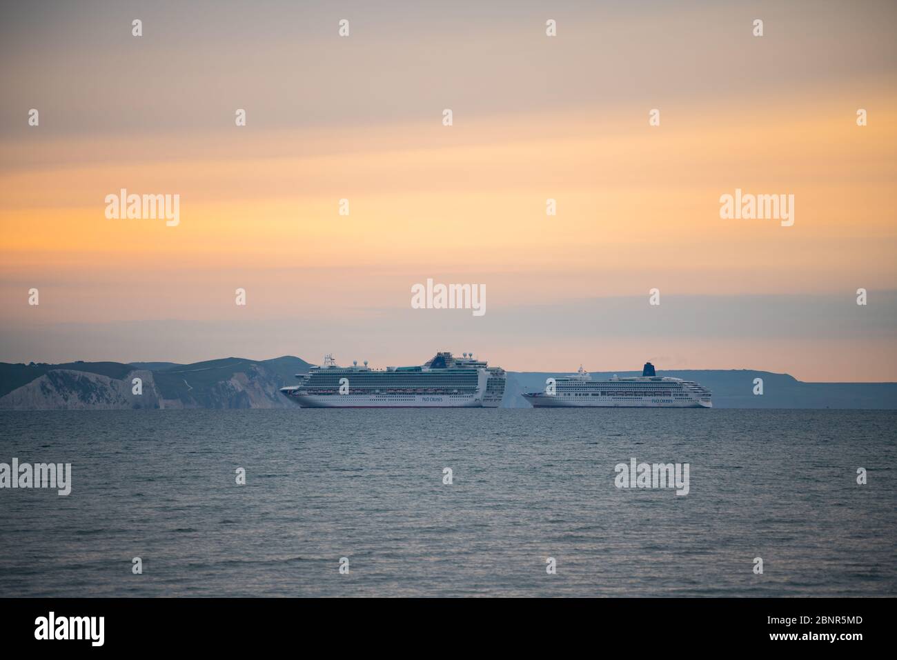 Weymouth, Dorset, UK. 16th MAY, 2020. UK Weather. Two cruise ships coming into weymouth bay in Dorset to anchor due to the cruising industry shutting down during the coronavirus lockdown. Credit: DTNews/Alamy Live Stock Photo