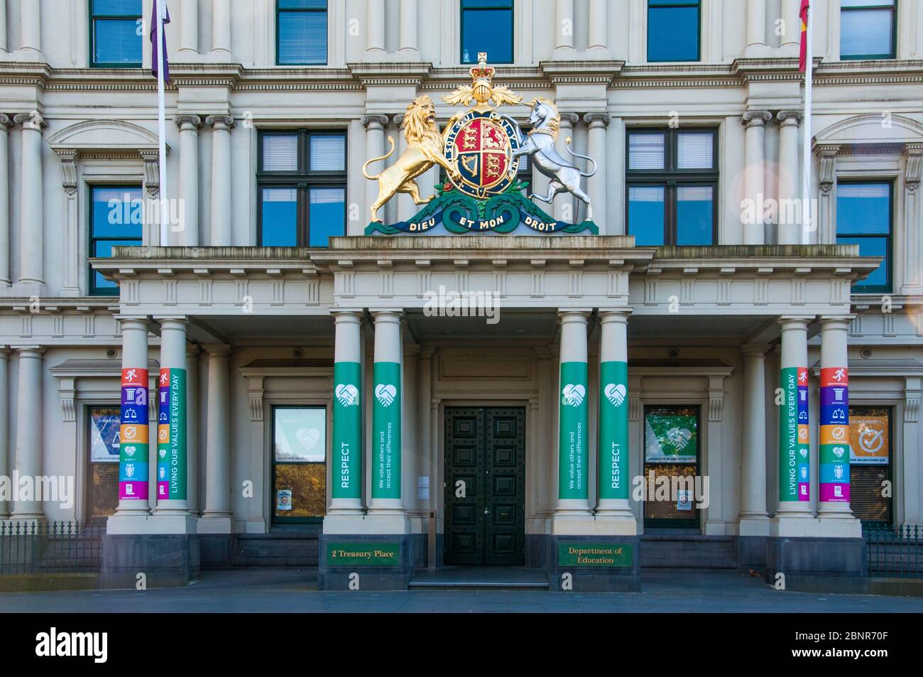 Head office of the state Department of Education, Melbourne, Victoria, Australia. British crest above the entrance reference's the state's origins Stock Photo