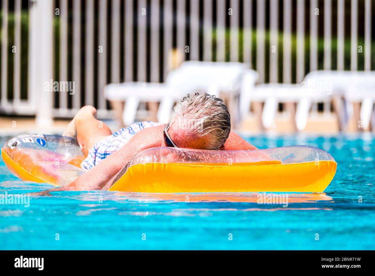 Lilo on swimming pool hi-res stock photography and images - Page 2 - Alamy