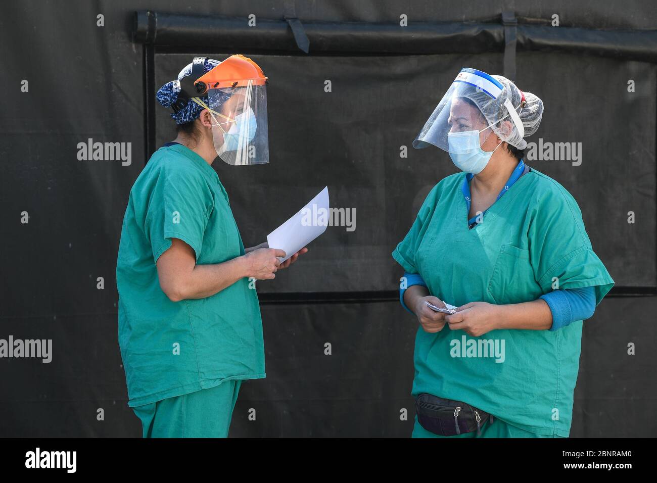 Santiago, Chile. 15th May, 2020. Health workers talk at San Jose Hospital in Santiago, Chile, May 15, 2020. Credit: Jorge Villegas/Xinhua/Alamy Live News Stock Photo