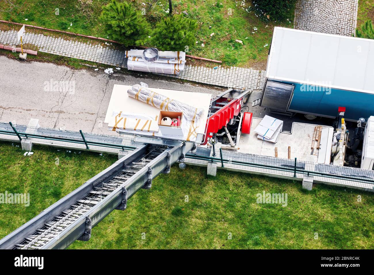 Ladder Removal House removal with a hydraulic ladder truck. Aerial view from above ...