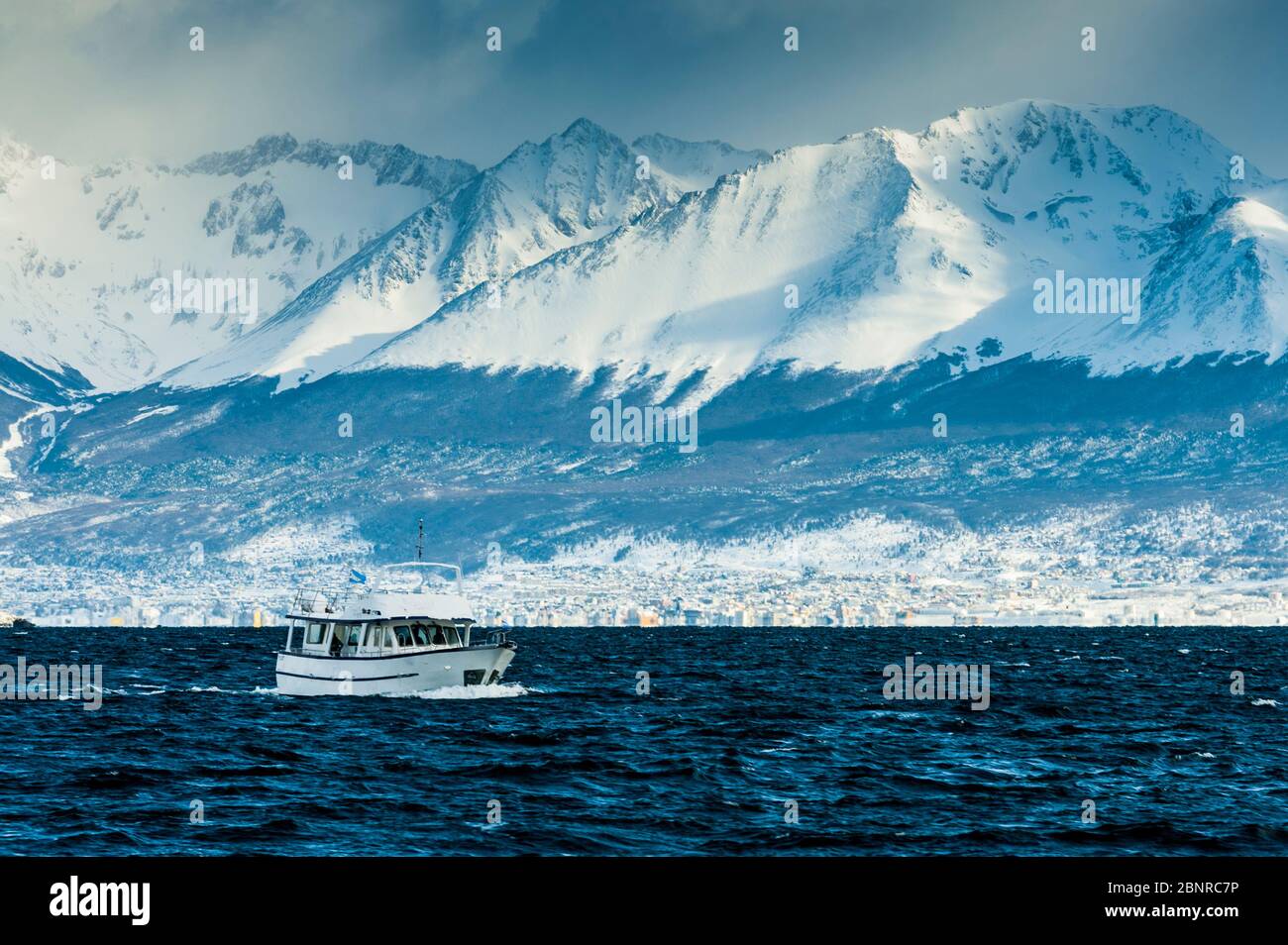 A boat is sailing from Ushuaia towards Beagle Channel. Argentina, South America. Stock Photo