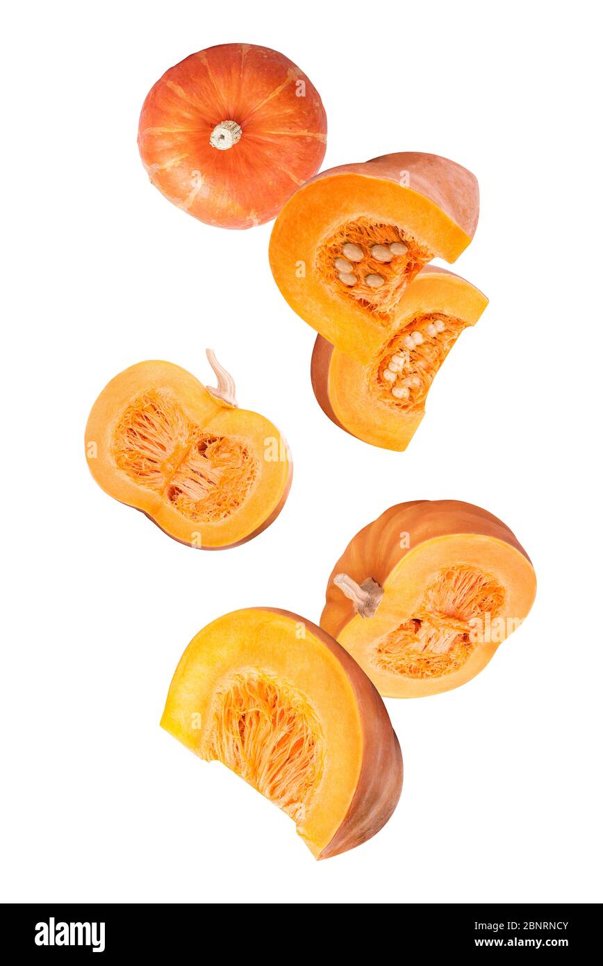 Falling pumpkins isolated on white background Stock Photo - Alamy
