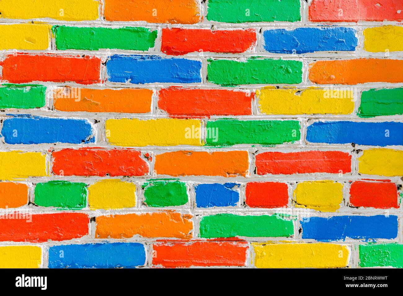 bright colorful multi-colored painted brick texture background, selective focus. Stock Photo