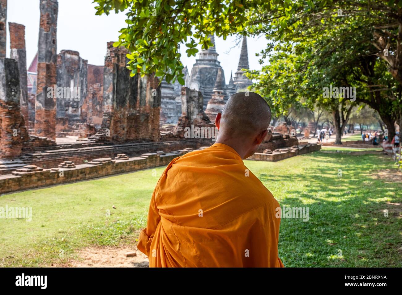 Ayutthaya, Bangkok / Thailand - February 9, 2020: Back side of monk, close up photo of Buddhist monk, name of this place 'Wat Phra Si Sanphet' temple Stock Photo