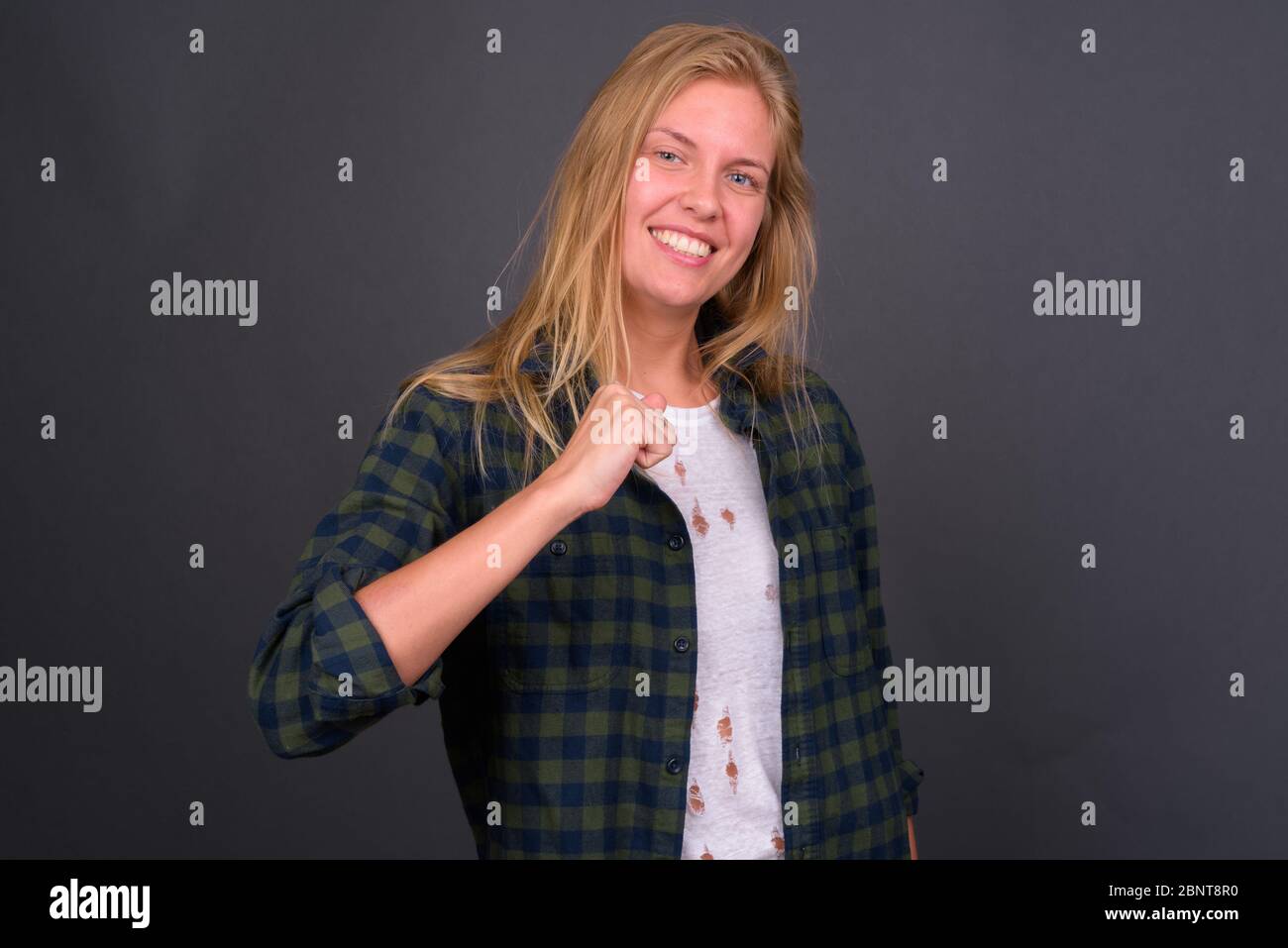 Excited young woman portrait hi-res stock photography and images - Alamy