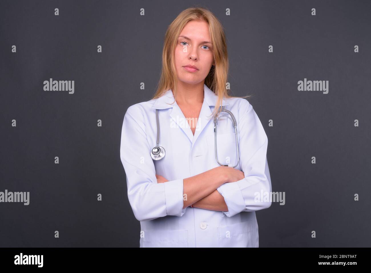 Beautiful young female doctor hi-res stock photography and images - Alamy