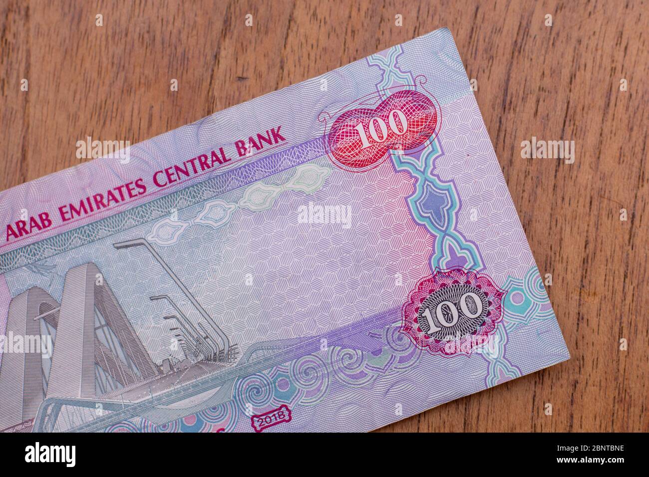 The Currency of the United Arab Emirates (UAE) Close up of a red one