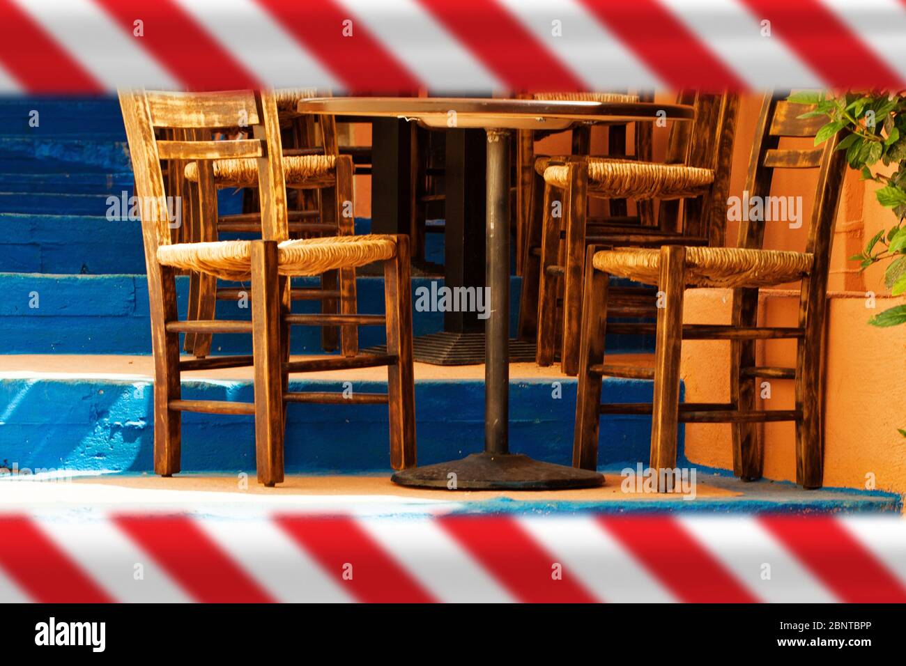 Closed restaurant with warning tape Stock Photo