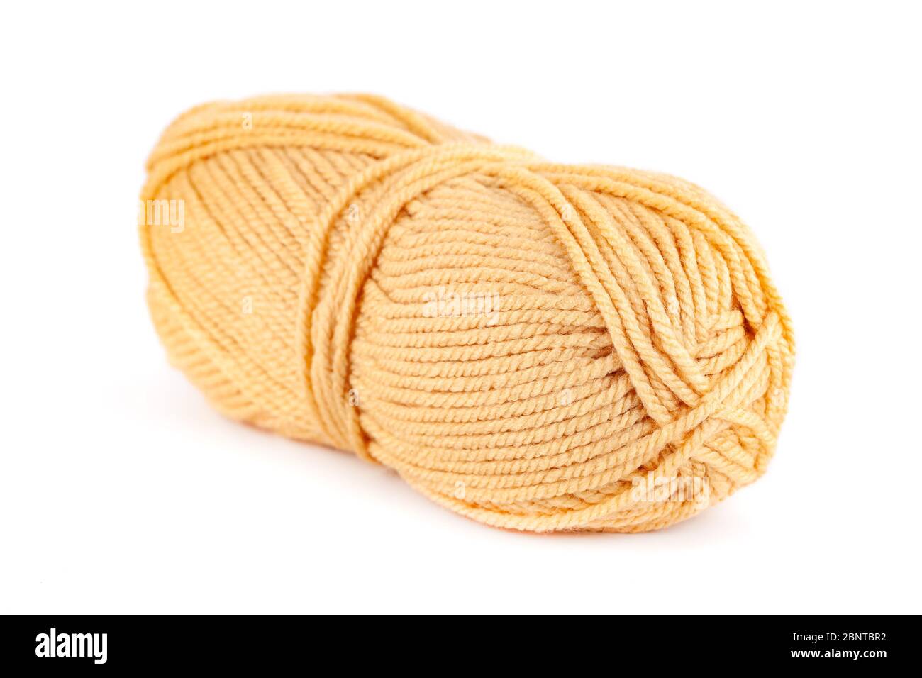 skein of yellow woolen yarn isolated on white background Stock Photo ...