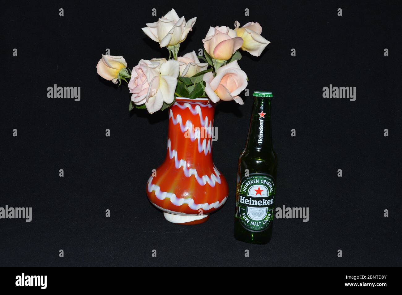 Still life with on bootle of heineken beer Stock Photo - Alamy