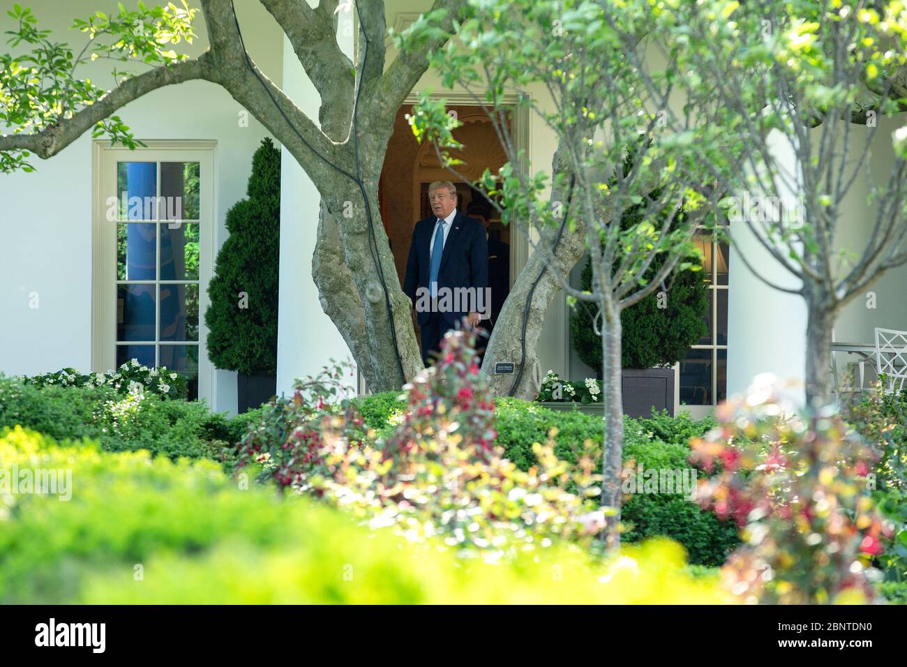 United States President Donald J. Trump steps out of the Oval Office as ...
