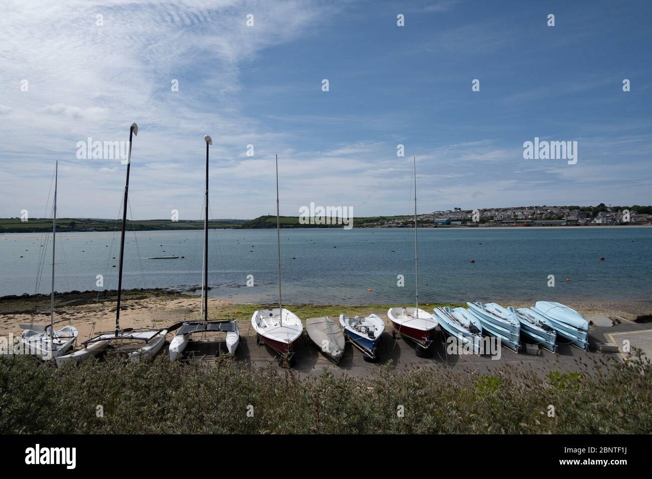 Rock, Cornwall, UK. 16th May 2020. UK Weather. The beach at Rock was still quiet today, despite the blue skies and sunshine. Credit CWPIX / Alamy Live News. Stock Photo