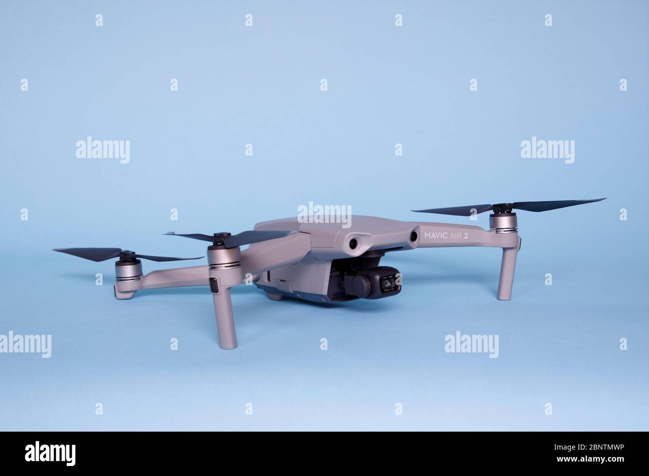 New Dji Mavic Air 2 model 2020 drone on blue background Quadcopter with 4k HDR Video HDR and 48MP photo camera. Stock Photo