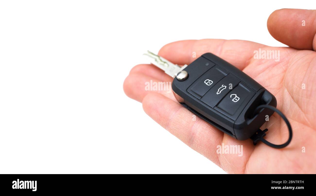 car remote control key in hand with white background Stock Photo Alamy